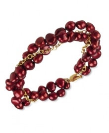 Go for a subtle hint of color. This beautiful bracelet features cranberry-colored cultured freshwater pearls (6-7 mm) set in 18k gold over sterling silver. Approximate length: 7-1/2 inches. Go for a subtle hint of color. This beautiful bracelet features cranberry-colored cultured freshwater pearls (6-7 mm) set in 18k gold over sterling silver. Approximate length: 7-1/2 inches.