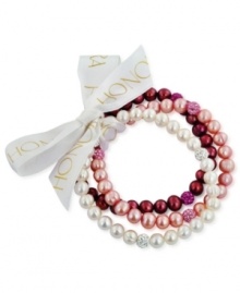 Beauty in bunches. Pink plays a starring role in this set of three cultured freshwater pearl (7-8 mm) stretch bracelets that offer a classic chic feel, with crystals adding luster. Approximate length: 7-1/2 inches.