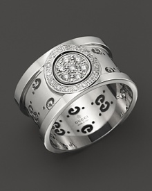 Gucci's iconic Gs circle a gleaming band of 18K. white gold. Gucci's iconic Gs circle a gleaming band of 18K. white gold.