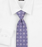 EXCLUSIVELY OURS. This statement-making design in fine silk is the perfect finishing touch.SilkDry cleanMade in USA