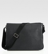 An urban essential crafted in premium buffalo leather, meant to stand up to everyday use with polished aplomb. Flap closure Adjustable logo strap Interior zip, cell phone pockets 15¾W X 13H X 3½D Imported 