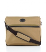 Take on the day with an everyday bag that plans out the particulars with interior organizational pockets and an easy-access center zip pocket to keep necessities on call and in reach. Daily wear and tear is no match for the durable construction of this flap-over messenger bag. 2-year warranty.