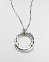 From the Metro Collection. A sleek, sophisticated circle, combining smooth and cabled sterling silver with accents of 18k gold, hangs from a richly textured silver chain and bale. Sterling silver and 18k yellow gold Chain length, about 18 Pendant diameter, about 1¼ Spring ring clasp Imported