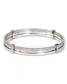 Introduce elegant sparkle into your jewel box with Chrislu's subtle crystal-encrusted bangles. Wear this timeless trio to trim both everyday and evening looks. Introduce elegant sparkle into your jewel box with Chrislu's subtle crystal-encrusted bangles. Wear this timeless trio to trim both everyday and evening looks.