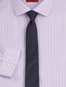 Lightly textured and slightly slimmer in premier Italian silk. About 2¼ wide Silk Dry clean Made in Italy Lightly textured and slightly slimmer in premier Italian silk. About 2¼ wide Silk Dry clean Made in Italy