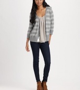 Bold, metallic stripes enhance this cozy, button-up v-neck. V-neck Button frontThree-quarter sleevesRibbed cuffs and hem69% rayon/31% metallic fiber trim38% cotton/25% rayon/15% polyester/14% nylon/8% meatallicHand washImported