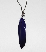 A metal encased feather on a link chain makes for a tribal chic pendant. FeatherSilverLength, about 23.6Pendant size, about 4Slip-on styleImported 