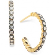 A display of outer beauty. These hoop earrings, crafted from 14k gold over sterling silver and oxidized sterling silver, dazzle with round-cut cubic zirconias. Approximate diameter: 3/4 inch.
