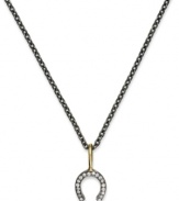 Let luck shine on you. This pendant, set in 14k gold over sterling silver and oxidized sterling silver, features a horseshoe design adorned with cubic zirconia accents for a lustrous look. Approximate length: 16 inches. Approximate drop: 3/4 inch.