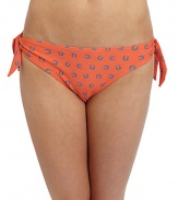 THE LOOKHorseshoe printElastic waist and leg openingsDecorative side ties with knot detailsTHE MATERIAL80% nylon/20% spandexFully linedCARE & ORIGINHand washImportedPlease note: Bikini top sold separately. 