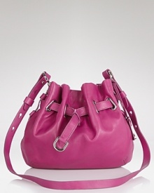The pouch is a playful accessory, yet Cole Haan's version has a mature side. In grainy leather with chic hardware, this beauty is all grown up with rich hues and heels. The pouch is a playful accessory, yet Cole Haan's version has a mature side. In grainy leather with chic hardware, this beauty is all grown up with rich hues and heels.
