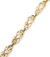 Perfect square knots. YellOra™'s chic bracelet features interlocking links made from a combination of pure gold, sterling silver and palladium. Approximate length: 7-1/4 inches.