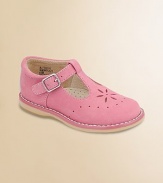 A classic t-strap design is updated with grip-tape closure for easy on and off, a perforated flower and dot detail.T-strap grip-tape closureNubuck leather upperRubber solePadded insoleLeather liningImported Please note: It is recommended that you order a ½ size smaller than measured. If your child measures a size 7.0, you may want to order a 6½. 
