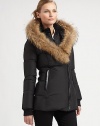 Featuring a natural Asiatic raccoon fur-trimmed hood, a cropped puffer jacket with the unmistakable style of Mackage.Fur-trimmed hoodRibbed cuffsZipper closureSlash pocketsFully linedAbout 30 from shoulder to hemBody: polyesterFill: down feathers/other feathersDry clean by fur specialistImportedFur origin: Finland Model shown is 5'10½ (179cm) wearing US size Small. 