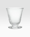 A stemless, mouthblown red wine glass weds modern design with classic style thanks to a gentle, wrap-around texture. From the Twirl CollectionGlass4¼H X 3¾ diam.Dishwasher safeImported
