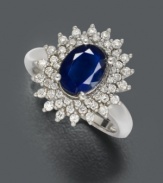Indulge in the sweet birthstone of September. This royalty inspired, breathtaking oval-cut sapphire (2-1/5 ct. t.w.) dazzles among a sunburst of round-cut diamond (1/2 ct. t.w.). Ring crafted in 14k white gold.