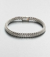 An intricately woven design,from the Bedeg Collection, set in sterling silver and 18kt-gold.Sterling silver/18kt-goldAbout 3 diam.Imported