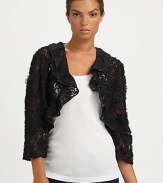EXCLUSIVELY AT SAKS. A classic bolero silhouette, dressed up with ribbon trim in a stunning lace design.Lace collarThree-quarter sleevesOpen frontPolyesterAbout 18 center backDry cleanMade in the USA of imported fabric