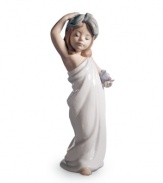 One bubble bath and this young lady is as good as new. A cute figurine for the master suite, handcrafted in Lladro porcelain.