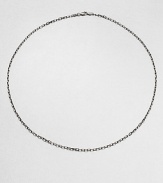 A charming, link chain necklace is constructed in gleaming sterling silver with a lobster claw and loop clasp.Sterling silverLobster claw/loop claspAbout 22 longMade in USA