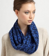 Ultra-soft in an animal printed plush wool and angora blend for supreme warmth and style.Merino Wool/Angora/Nylon14.5W X 12.5L X 13.5DDry cleanImported
