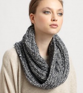 A cozy, stretchy knit wrap is crafted in a luxe blend of wool, cotton and mohair.Wool/Cotton/Mohair/Nylon16W X 13L X 15.5DDry cleanImported