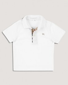 A classic short sleeve polo with a check lined half placket. A classic short sleeve polo with a check lined half placket.