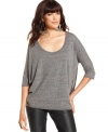 A sheer mesh back adds eye-catching edge to this RACHEL Rachel Roy top -- perfect over the season's skinny jeans!