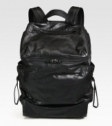 With an array of exterior and interior zip pockets, this roomy backpack provides endless versatility, while comfortably storing your tablet, documents or any other city essentials. Crafted shiny, lustrous lambskin leather for a waxy finish.Zip closureTop handleExterior zip pocketsInterior zip, slip pocketsCotton liningLambskin14W x 22H x 8DImported