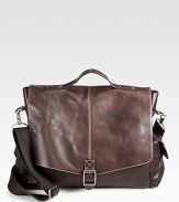Crafted from luxurious full grain enzyme washed vachetta leather satchel-style messenger bag with contrast digital print, this is a suitable accessory for your everyday needs.Flap, buckle closureTop handleRemovable, adjustable shoulder strapExterior pouch pocketsInterior slip pocketCotton twill/leather liningLeather13W x 16H x 5DImported