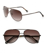 A favorite style updated with a curved brow bar in lightweight metal. Available in bronze frames with gradient brown lenses.Metal100% UV ProtectionMade in Italy