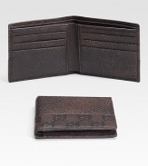 Dark brown leather with guiccissima leather trim. Six card slots Two bill compartments 4.3W X 3.8H Made in Italy 
