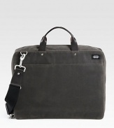 An updated classic with metropolitan style, crafted in sleek and sturdy waxed cotton with leather details.Zip closureTop handlesAdjustable shoulder strapExterior, interior zip pocketOrganizing pocketsFully lined12W x 16H x 3DImported