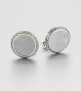 From the Classic Chain Collection. Fascinating meteorite stone, with a rich scratched texture, forms the center of this distinctive design, set in a sterling silver Batu-carved frame.MeteoriteSterling silverSwivel backMade in Bali