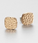 From the Palu Collection. Hammered by hand, the undulating surface of this striking square design is meant to evoke the mottled surface of the moon.Sterling silver and bronzeSwivel backMade in Bali