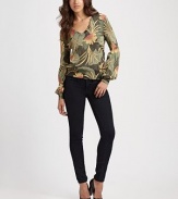 Vintage florals highlight this feminine blouson silhouette, finished with a hint of sparkle.V necklineGathered sleevesBlouson bodiceAbout 24 from shoulder to hem75% cotton/16% nylon/9% metallicHand wash or dry cleanImported