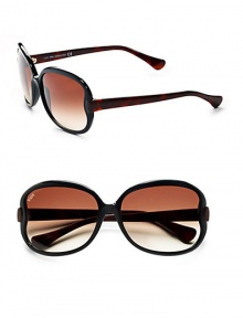 THE LOOKRounded style Etched logo on lens Logo accented temples UVA and UVB protectionSignature case includedTHE COLORBlack with gradient brown lensesORIGINMade in Italy THE LOOKRounded style Etched logo on lens Logo accented temples UVA and UVB protectionSignature case includedTHE COLORBlack with gradient brown lensesORIGINMade in Italy