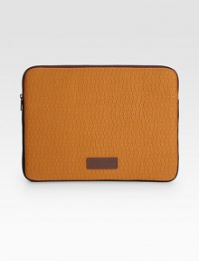 The signature logo print adorns this protective laptop case made of colorful embossed leather.Zip closureLeather13W X 10H X ¾DImported The signature logo print adorns this protective laptop case made of colorful embossed leather.Zip closureLeather13W X 10H X ¾DImported