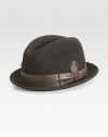A dapper wool and leather hat accented with a feather. WoolLeather accentBrim, about 1½Spot cleanImported