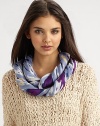 A pretty tribal print with raw edge details. ModalAbout 40 X 80Dry cleanImported 