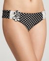 This retro polka dot bikini from Betsey Johnson was made with punky pin-ups in mind. Turn the boardwalk into a catwalk with a bright red lip and cat eye shades.