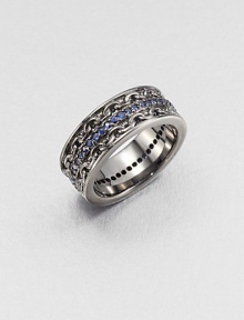 A singular row of blue sapphires adds definition to this modern design in burnished sterling silver.Sterling silverBlue sapphireAbout 2 diam.Imported A singular row of blue sapphires adds definition to this modern design in burnished sterling silver.Sterling silverBlue sapphireAbout 2 diam.Imported
