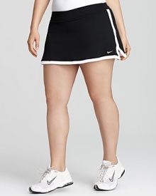 Serve a smashing hit in this retro-style Nike skirt. Built-in shorts lend comfort and coverage.