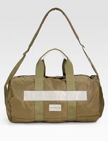 A handy duffel that takes you from the gym to the beach to the plane and back again in durable nylon. Zip closure Top handles Adjustable shoulder strap Interior pockets Nylon 22W X 11¼H X 11¼D Imported A handy duffel that takes you from the gym to the beach to the plane and back again in durable nylon. Zip closure Top handles Adjustable shoulder strap Interior pockets Nylon 22W X 11¼H X 11¼D Imported