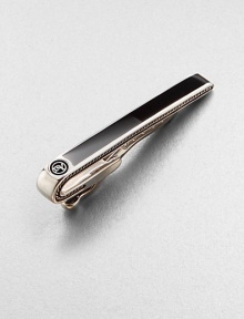 A timeless sartorial standard in smooth sterling silver with black onyx inlay.Sterling silverBlack onyxAbout 2 longImported A timeless sartorial standard in smooth sterling silver with black onyx inlay.Sterling silverBlack onyxAbout 2 longImported