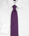 An intricate pindot pattern woven with premiere silk luxury. Silk; dry clean Made in USA 