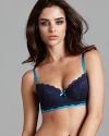 Make a sexy statement in a lace contour bra with a vibrant contrast trim.