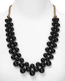 A whimsical web of enamel beads gracefully pulls an ensemble together. We imagine these with a ladylike twinset or little black dress. A whimsical web of enamel beads gracefully pulls an ensemble together. We imagine these with a ladylike twinset or little black dress.