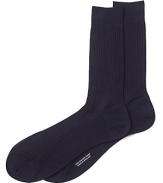 Turnbull & Asser maintains its focus on quality craftsmanship and luxury even on everyday essentials like fine dress socks in soft, breathable cotton.