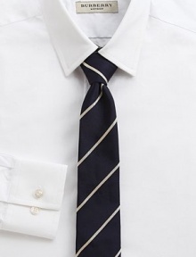 Classic dress essential, beautifully crafted in superior Italian silk with elegant pinstripe detail.SilkDry cleanMade in Italy Classic dress essential, beautifully crafted in superior Italian silk with elegant pinstripe detail.SilkDry cleanMade in Italy